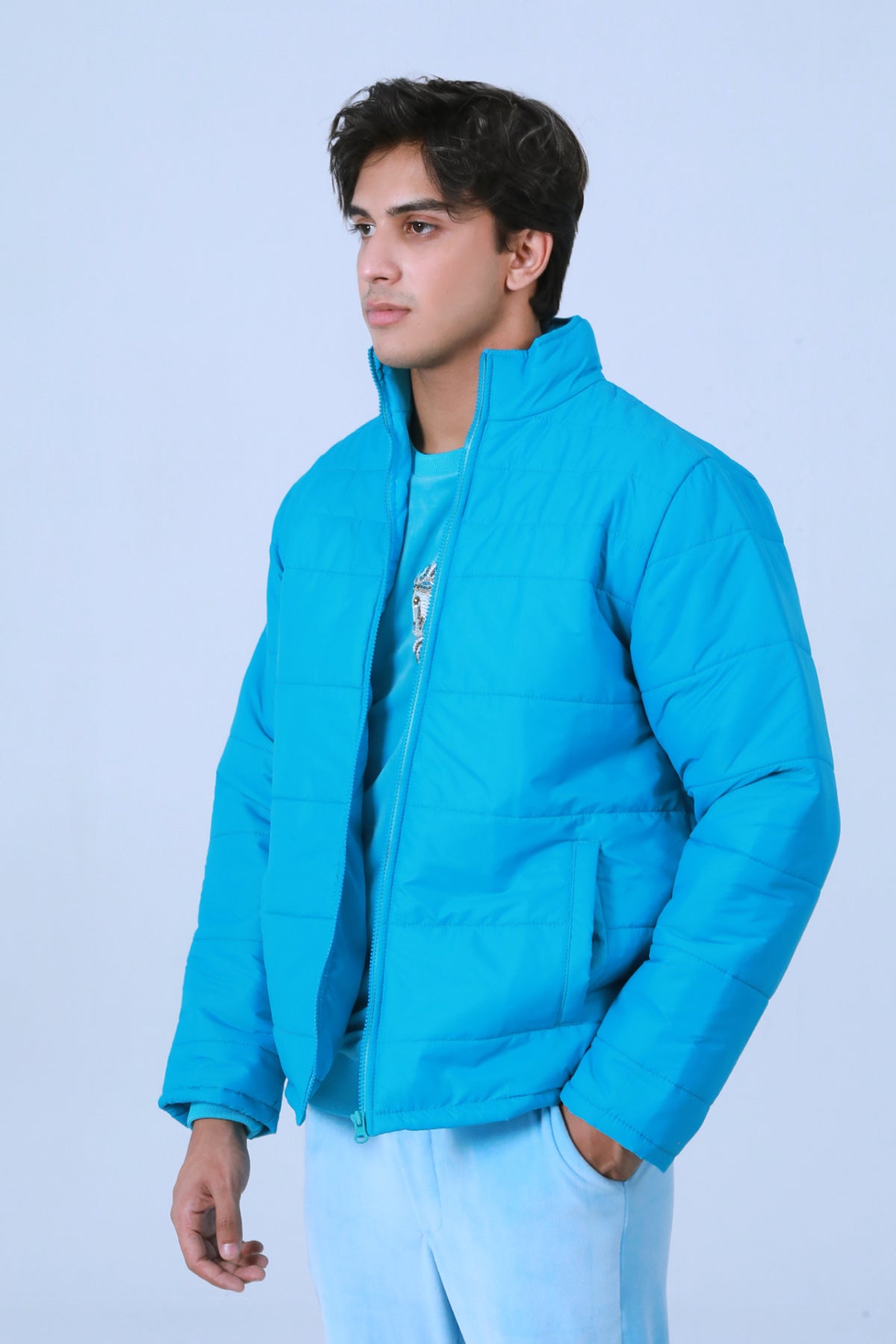 Blue Puffer Jacket - Brackets